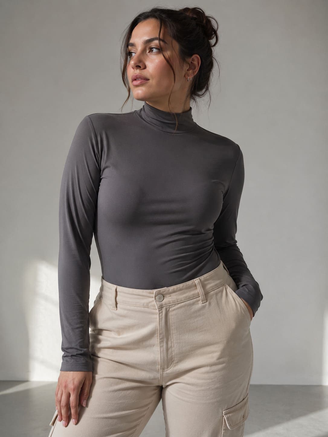 Body cuello alto manga larga gris